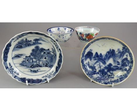 A group of eighteenth and nineteenth century Asian porcelain. To include two hand-painted Chinese blue and white saucers and 