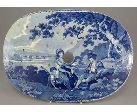 An early nineteenth century blue and white transfer-printed George and Edward Phillips Pastoral pattern drainer, c. 1825. It 