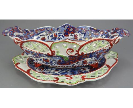 An early nineteenth century blue and white transfer-printed Spode pattern 2635 chestnut basket and stand, c. 1825. It is mark