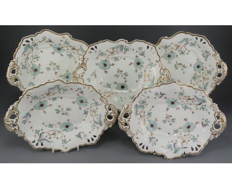 A mid-nineteenth century porcelain hand-painted Alcock part dessert service, c. 1850.  Each piece is decorated with floral sp