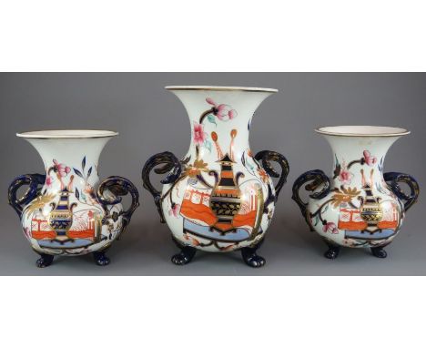 An early nineteenth century Spode porcelain hand-painted garniture of vases, c. 1820. They each stand upon three paw feet, ha