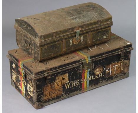 A black japanned-metal domed-top traveling trunk with a hinged lift-lid &amp; with wrought-iron side handles, 67.5cm wide x 2