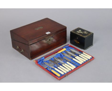A 19th century mahogany writing slope with a fitted interior, 35.5cm wide; together with a mother-of-pearl inlaid two-divisio