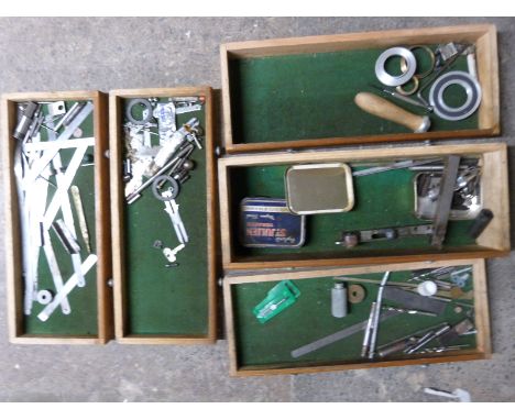 A wooden union toolmaker's chest of drawers and contents to include lathe tools