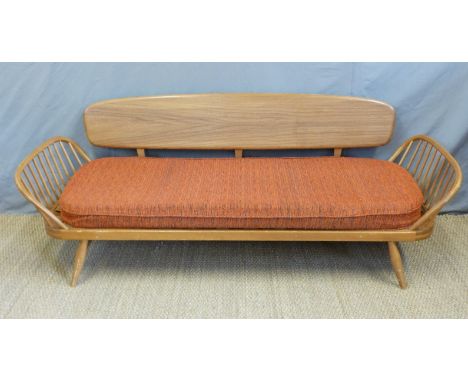 A retro Ercol light elm studio couch or sofa with original 1960/70's cushions (H77 x L207 x D76cm)