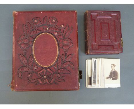 Two Victorian photo albums and contents, an empty album and a quantity of loose portrait photographs