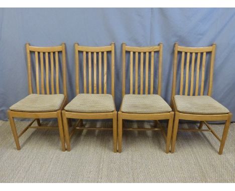 Four Ercol upholstered dining chairs 