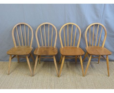 Four retro Ercol light elm chairs
