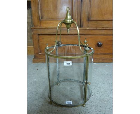 A 19thC circular brass and glass lantern light fitting, height 57cm