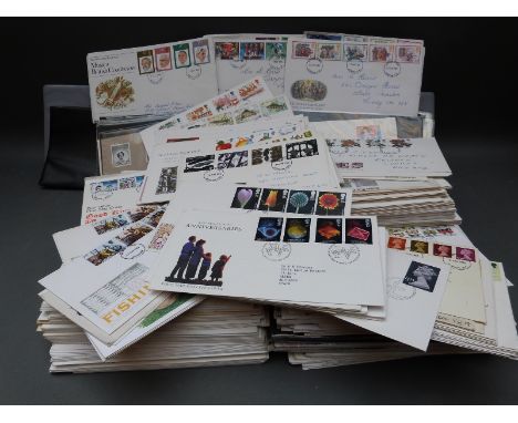 A large quantity of mainly GB first day covers, in albums and loose