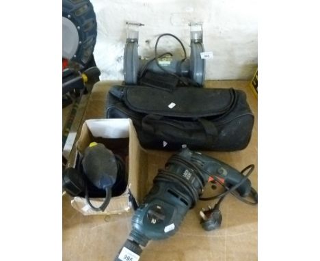 A bench grinder, angle grinder, Black & Decker drill and a sander