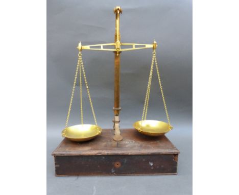 A set of Class B brass bank type scales by Avery, raised on a wooden base with integral drawer together with Troy and other w