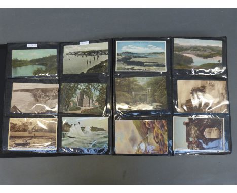 An album of approximately 450 mainly early 20thC UK topographical postcards including Wales, Isle of Wight, Ireland, Scotland