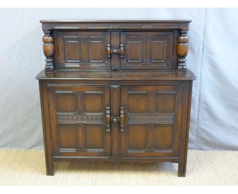 An Ercol court cupboard (H123 x W124 x D45cm)