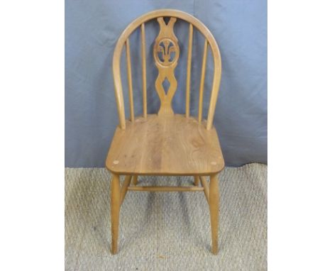 A retro Ercol light elm chair 