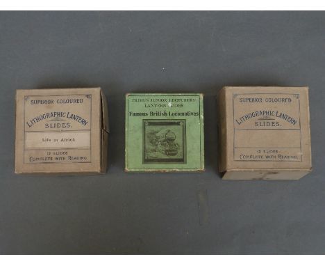 A box of lithographic magic lantern slides depicting life in Africa showing village life and a British soldier being entertai