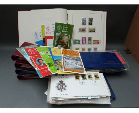 A collection of Jersey first day covers presentation packs, loose stamps