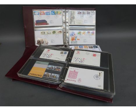 Three albums of GB first day covers, presentation packs and coin/stamp covers 