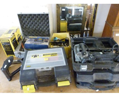 A quantity of tools to include Black & Decker sander, biscuit jointer, sander, cordless jigsaw, drill, paint sprayer etc