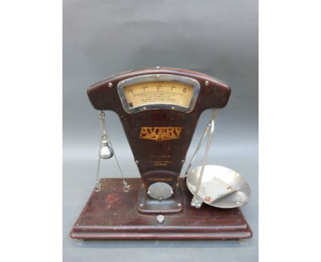A set of Avery shop scales in wood effect finish