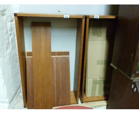 Two wall cabinets and a shelf from the retro Tapley SL teak furniture range with a levelling beam to mount