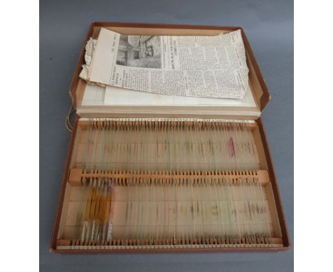 A boxed set of glass microscope slides with list of contents catalogued and numbered, comprising largely human histology sect