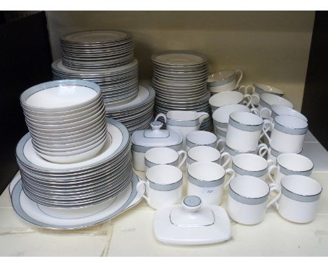 Royal Doulton twelve place setting dinner and tea service with extras in the Etude pattern
