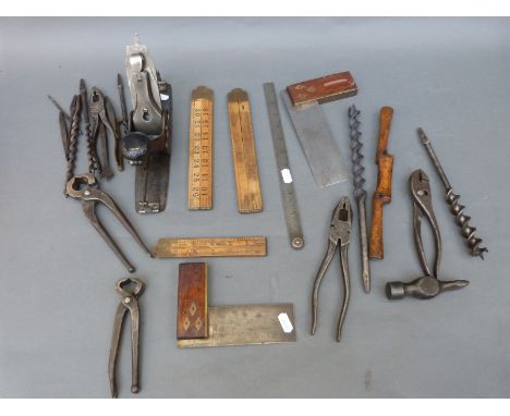 A Stanley Rule and Level Co. No 113 compass plane and a quantity of further woodworking tools including folding rules