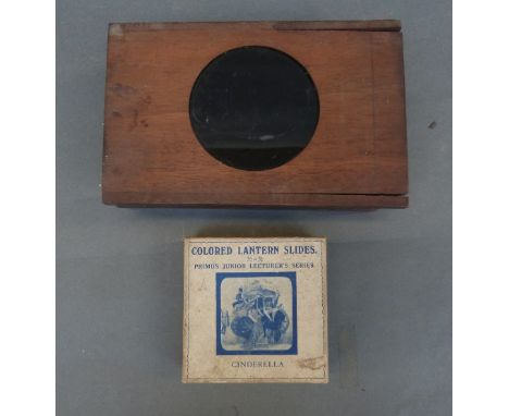 A quantity of mechanical and still slides to include a boy juggling a ball, a boy attaching a metal bucket to a dog's tail & 