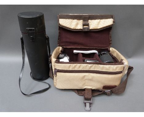 Praktica MTL5B SLR camera, together with a Pentacon 1.8/50 lens, Sigma 80/200mm lens, Optomax 400mm lens etc