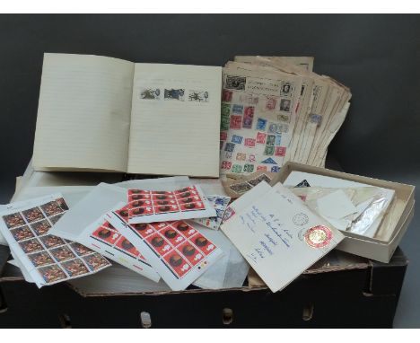 A box of GB first day covers and presentation packs
