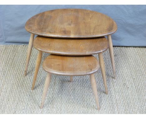 A retro Ercol light elm nest of pebble shaped tables (H41 x L66 x W47cm)
