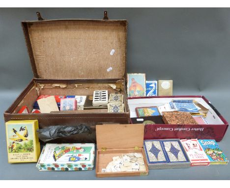 A large quantity of playing cards, most in packs together with 'Birds of Europe' card game, 'Found in a Green Grocers' etc
