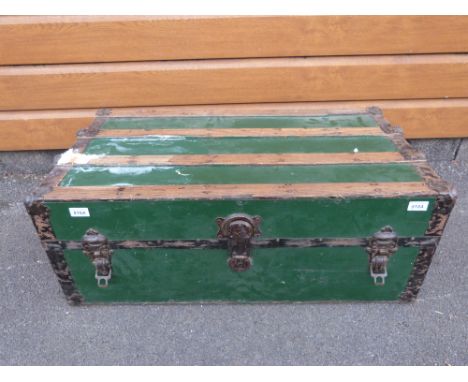A vintage ash and metal bound trunk with leather handles
