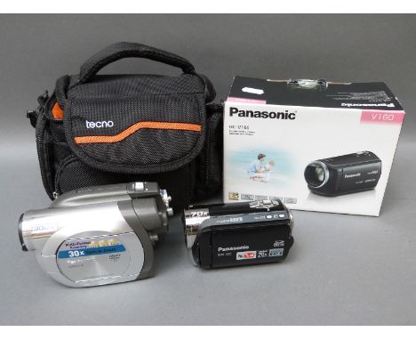 A boxed Panasonic HC-V160 digital HD video camera, Panasonic SDR-S26 and Panasonic VDR-D100 camcorders 