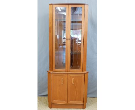 A retro G Plan glazed corner cupboard with three glass shelves and two door cupboard arrangement with shelf (H193 x W75cm)