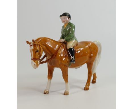 Beswick model of boy mounted on Palomino horse, model 1500. 