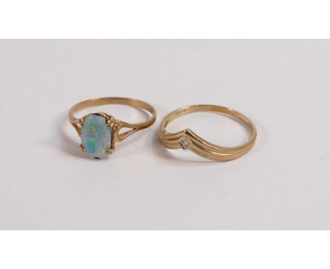 9ct diamond wishbone ring, size R, 1.4g and yellow metal ring set with oblong opal stone, 1.5g. (2) 