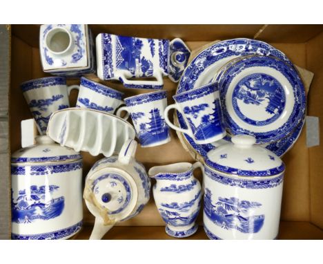 A collection of Wade Ceramic Ringtons advertising items to include storage jars, teapot, mugs etc .  These were removed from 