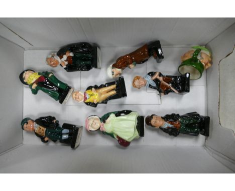 A collection of Royal Doulton Dickens figures to include Tiny Tim, Artful Dodger, Scrooge, Sairy Gamp, Micawber, Buzfuz, Tony