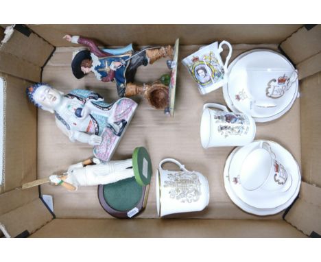A mixed collection of items to include Royal Doulton Resin Figure, Commemorative Cups &amp; Saucers, Damaged Buddha figure et