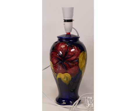 Moorcroft Hibiscus on blue lamp base. Height with fittings 36cm 