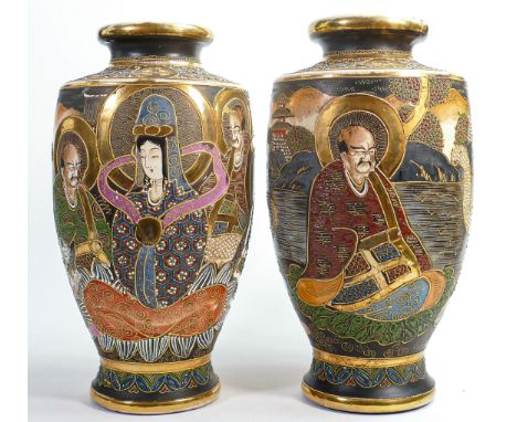 Pair of large Satsuma vases, gilded and enamel decorated all around with male &amp; female characters, h.31.5cm. (2) 