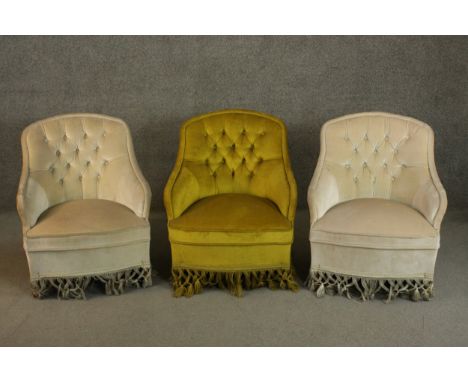 A set of three matching small Victorian style armchairs, two upholstered in beige, the other in green, with button back. H.76