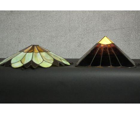 Two Tiffany style stained glass lamp shades, one of pyramid form, the other more foliate. H.17 Dia.50cm. (largest) 