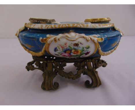 A Sevres style ceramic inkwell on gilt metal base