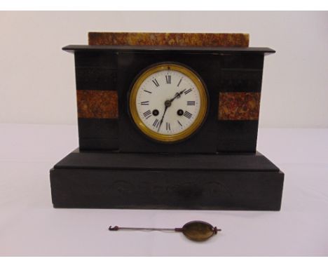A black slate mantle clock two train movement to include pendulum