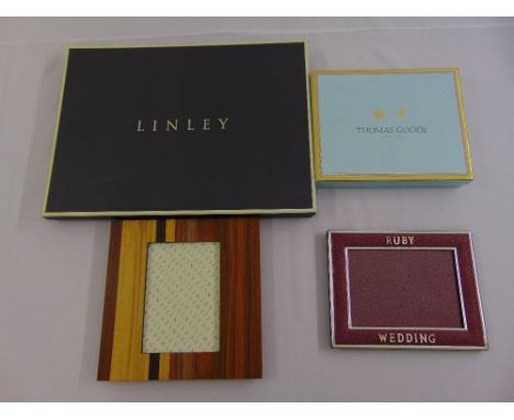 David Linley a rectangular wooden photograph frame and a Thomas Goode ruby wedding photograph frame