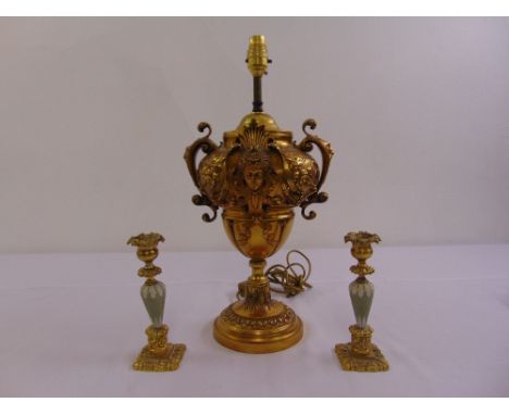 An Ormolu Baroque style lamp base with scroll side handles on raised circular base and a pair of Jasperware candlesticks with