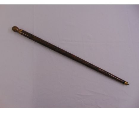 An Edwardian mahogany billiard cue cum walking stick